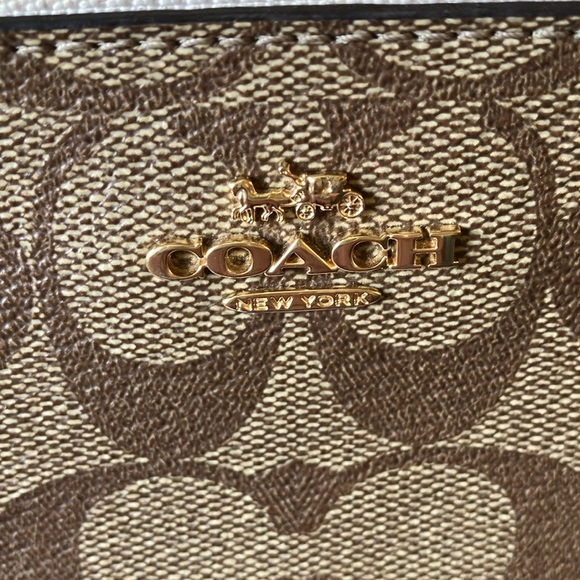 Coach: Signature Canvas Double Corner Zip Wristlet - Picture 2 of 16